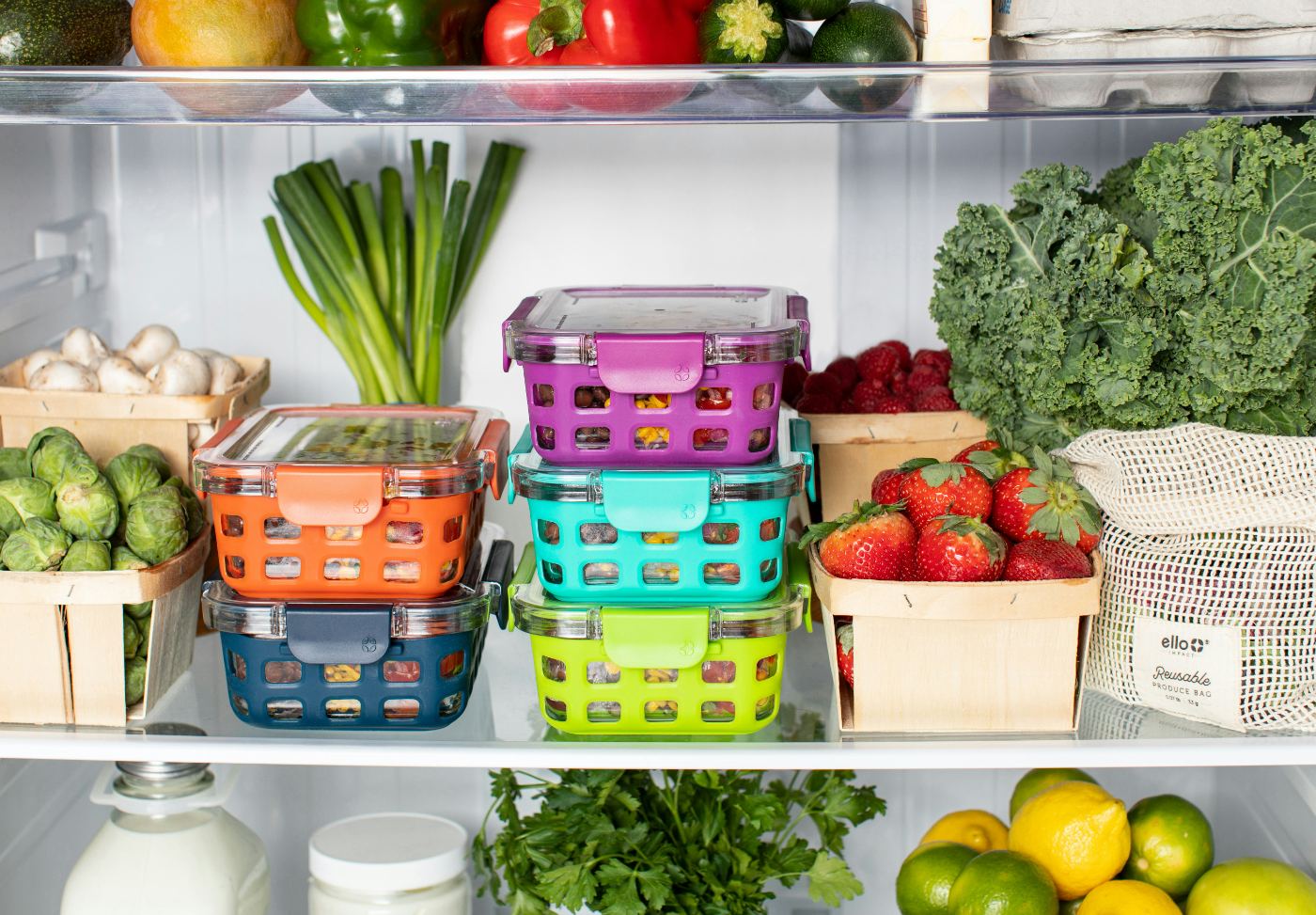 A clean, well-organized fridge full of produce